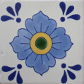 Traditional decorative Mexican Talavera tile in blue flower design